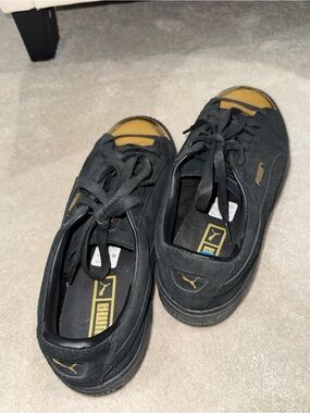 Puma Black Suede Sneakers with Gold Accents